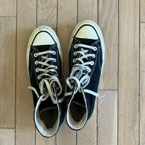 Black and white converse high tops